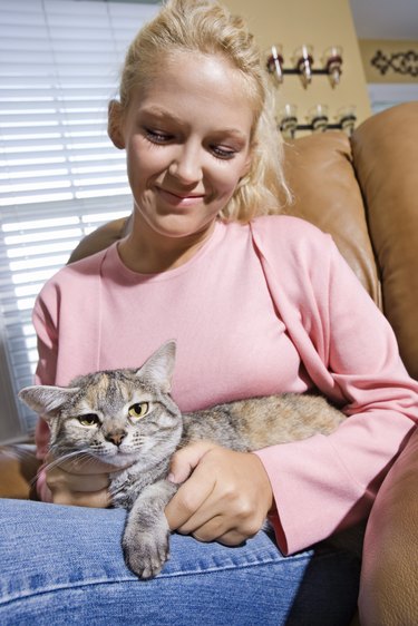 Woman with pet cat