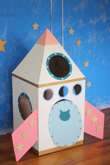 Finished cardboard cat rocket ship