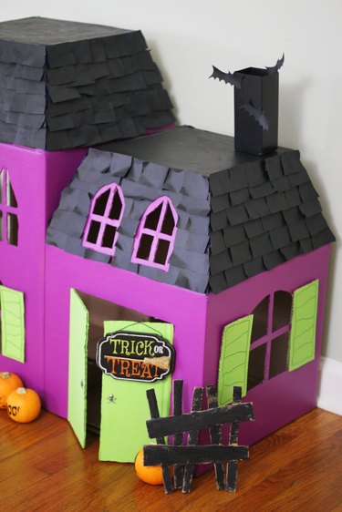 Side view of haunted pet house
