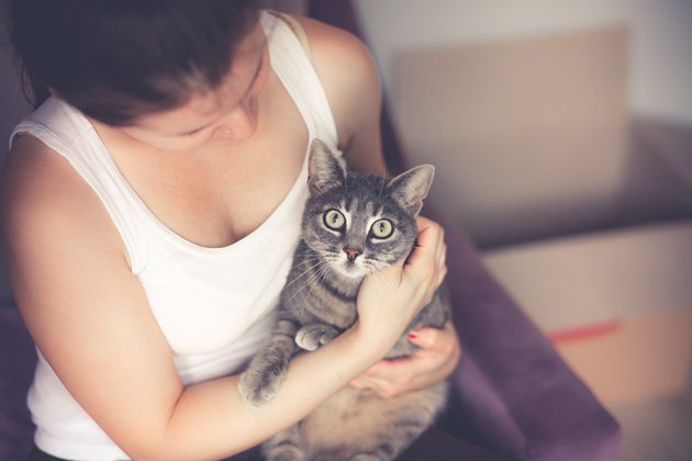 Women holding her cat