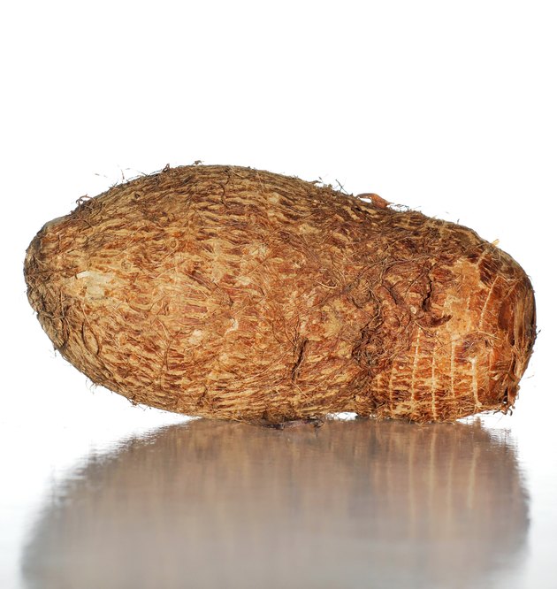 Yam on a white surface with white background.