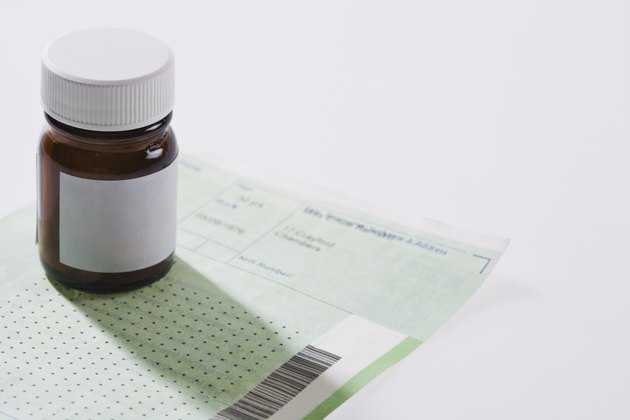 Pill bottle on doctors prescription