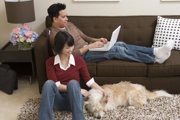 Couple relaxing in living room