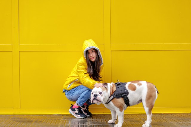 teen girl walking with DOG