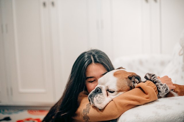 female taking care of her dog