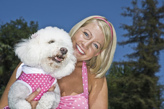 Smiling woman with Poodle